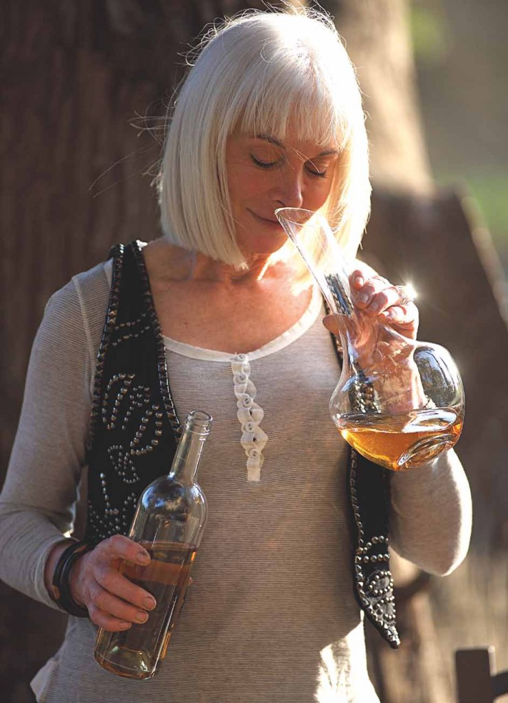 Marlène Soria of Peyre Rose enjoying the scents of her white wine
