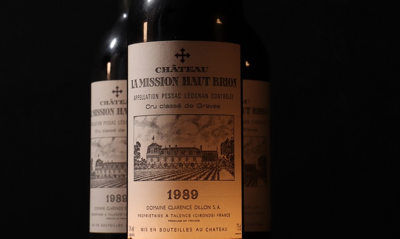 Bottles of mature Bordeaux wines for a dinner party pairing idea