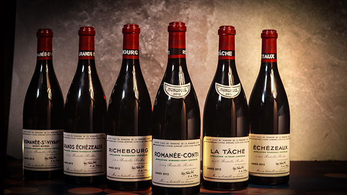 bottles of domaine de la romanie conté - the highest priced wines on iDealwine in 2023