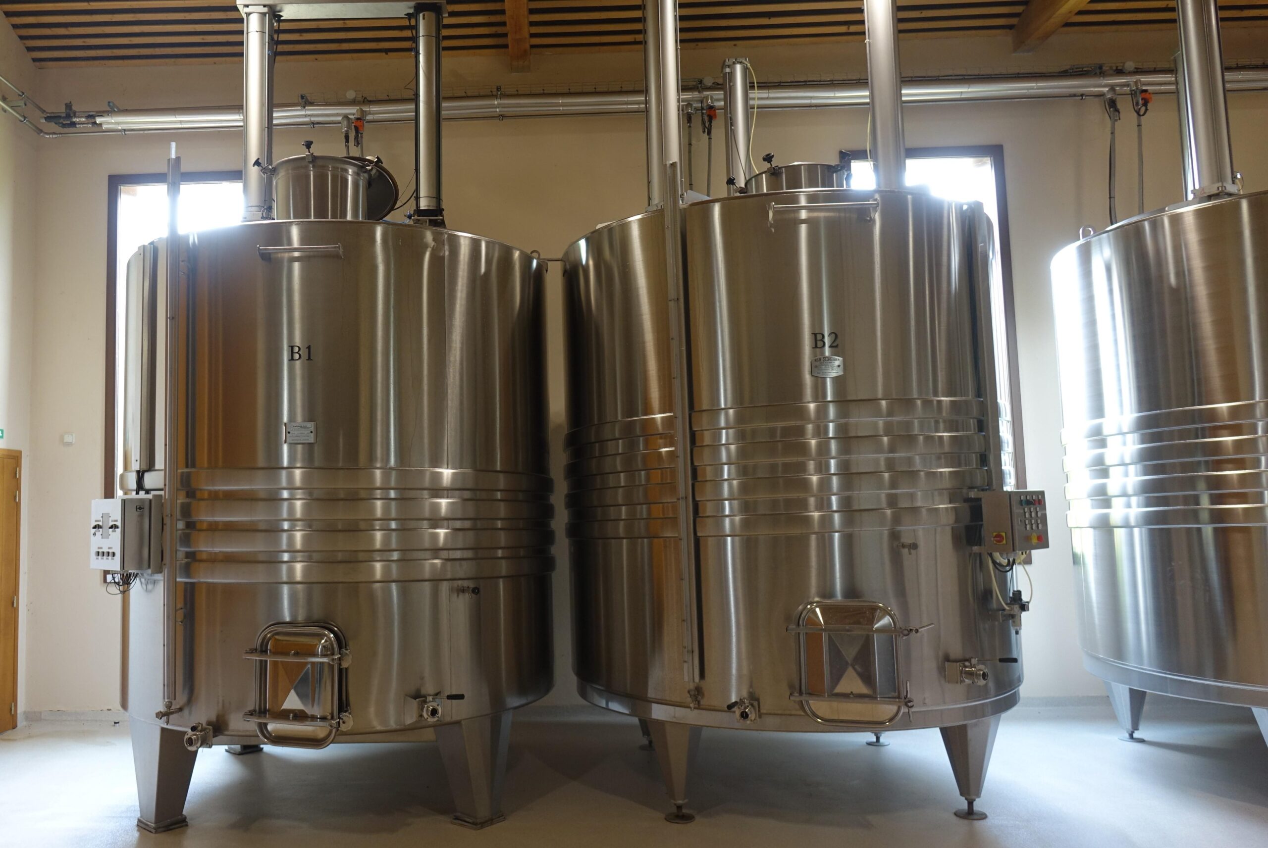 Stainless steel vats in a winery