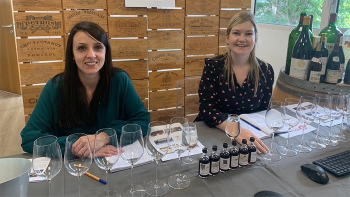 Laura and Orlaith tasting wine