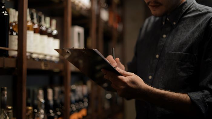 Somebody checking wine