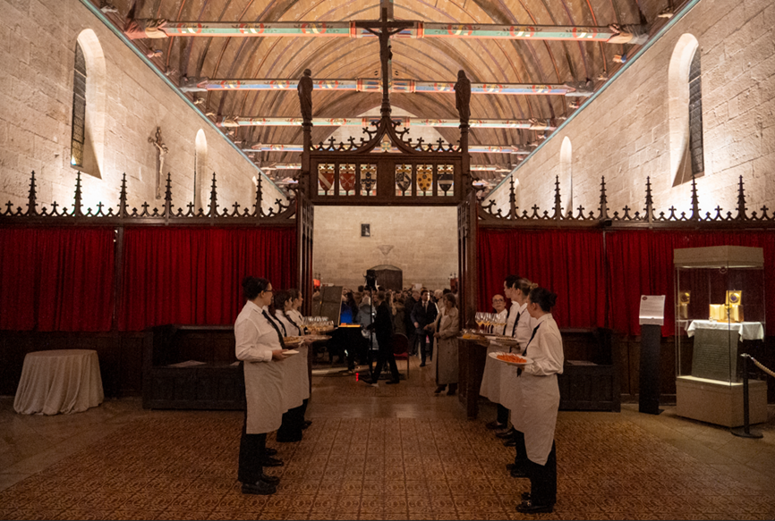 Waiters lining up to serve the wine at the Hôtel-Dieu de Beaune during the charity gala
